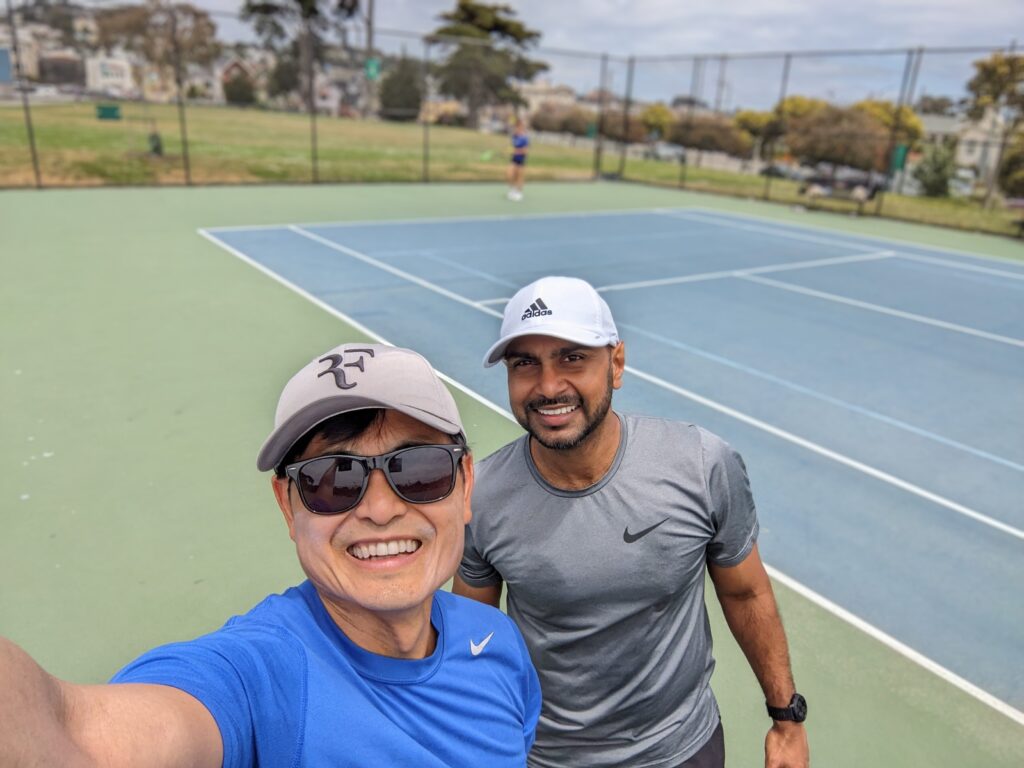 Malinka & Tony on tennis court