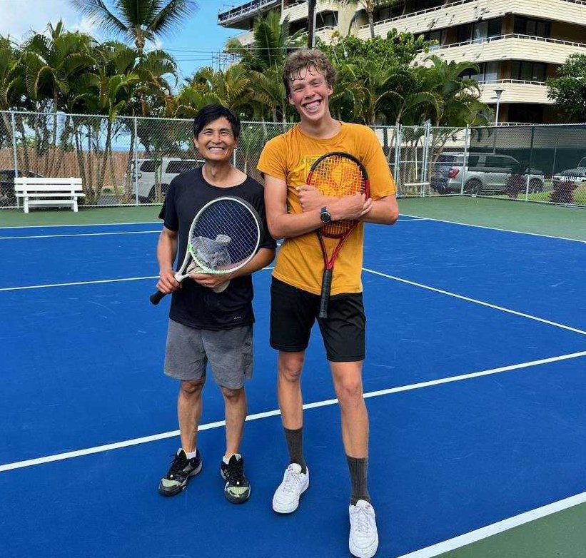 Tony & Austin on tennis courts in Kona